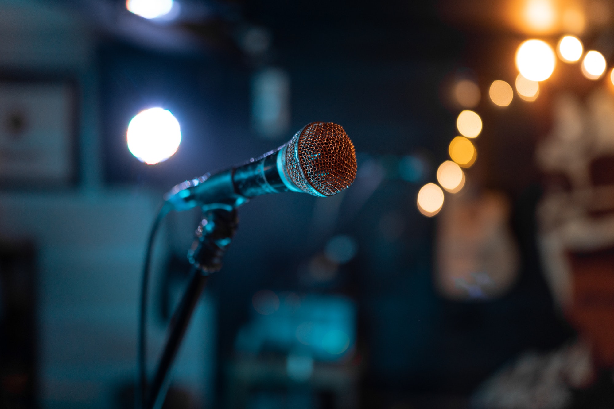 Close up of a classic microphone standing before a music show